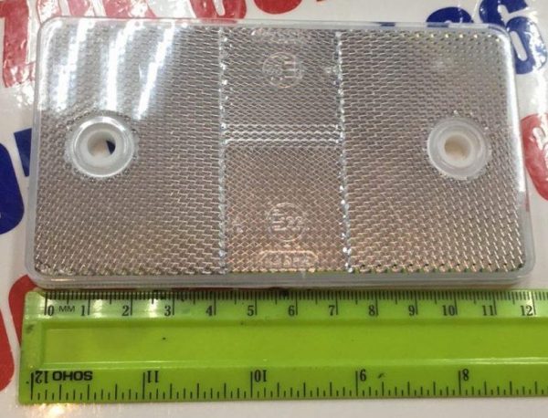 Катафот прямоугольный с отверстиями широкий (белый) 12,5х7см (пр-во Украина) Катафот прямоугольный с отверстиями широкий (белый) 12,5х7см (пр-во Украина)