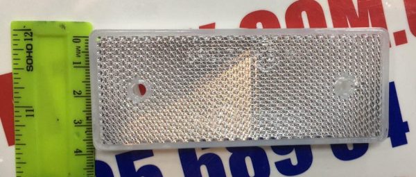 Катафот прямоугольный с отверстиями (белый) 10,2х4см (пр-во Украина) Катафот прямоугольный с отверстиями (белый) 10,2х4см (пр-во Украина)