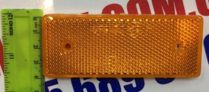 Катафот прямоугольный с отверстиями (оранжевый) 10,2х4см (пр-во Украина) Катафот прямоугольный с отверстиями (оранжевый) 10,2х4см (пр-во Украина)