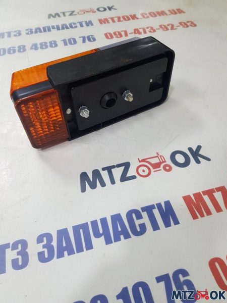 Фонарь МТЗ передн. многофункциональный с кожухом 12В (пр-во Чехия) 9440.85 Фонарь МТЗ передн. многофункциональный с кожухом 12В (пр-во Чехия) 9440.85