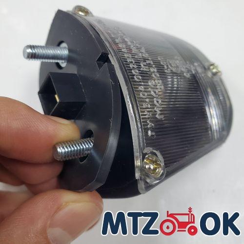 Фонарь освещения номерного знака МТЗ 12В (пр-во Украина) 2202.3.01.17 Фонарь освещения номерного знака МТЗ 12В (пр-во Украина) 2202.3.01.17
