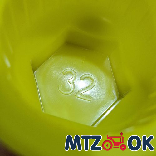 Колпачек на гайку 32 (пластик) стрелка Колпачек на гайку 32 (пластик) стрелка