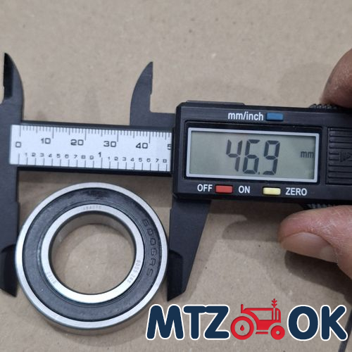 Колпачек на гайку 32 (пластик) стрелка Колпачек на гайку 32 (пластик) стрелка